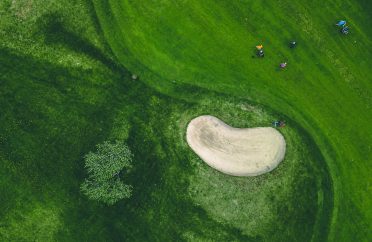 aerial-view-of-green-grass-at-golf-course-in-finland.jpg